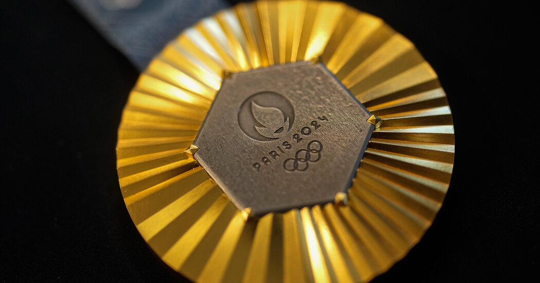 altin-gumus-ve-demir-mi-olimpiyat-madalyalarinda-eyfel-kulesinin-parcasi-olacak-OhTIJcdt.jpg